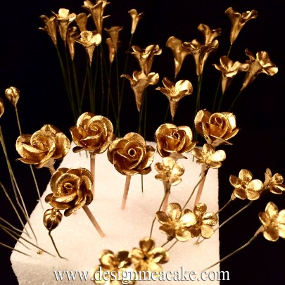 Miniature handmade gumpaste flowers.